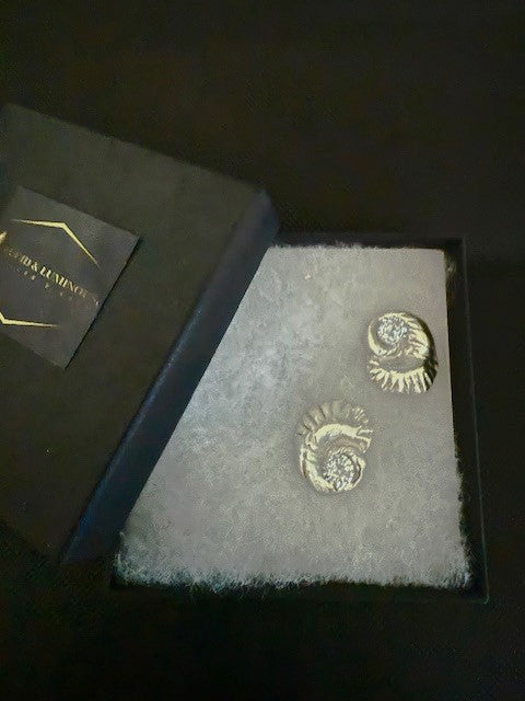 Embrace the beauty of the sea with these exquisite seashell stud earrings, meticulously handcrafted from precious Art Clay Silver—refined into .999 pure fine silver for a radiant, lasting finish. Each earring captures the graceful curves of a seashell, symbolizing peace, renewal, and a deep connection to nature.