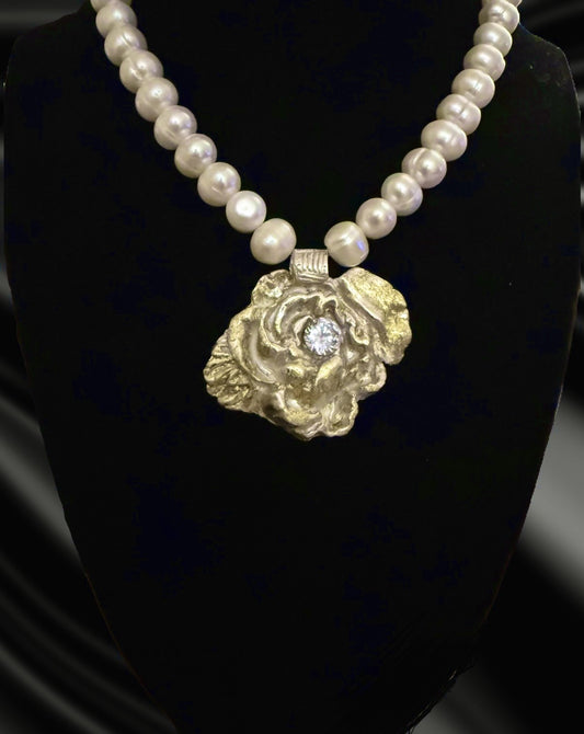 imeless beauty.

Celebrate artistry and tradition with this exquisite flower necklace, meticulously handcrafted from .999 pure fine silver and adorned with radiant 24K gold sheet using the&nbsp;ancient Korean Keum-Boo technique. This centuries-old gilding process bonds pure gold to silver, creating a warm, luminous contrast that will never fade.