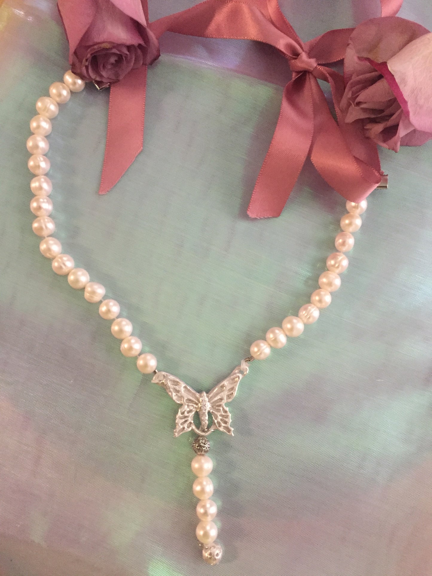 Silver Butterfly Necklace with pearl and ribbon.Butterfly Pendant with the Natural Freshwater pearl necklace, and the pink satin ribbon tie making the length adjustable. Art Clay Silver Jewelry Handmade, Fine Silver, .999 Pure Silver.Silver, .999 Pure Silver