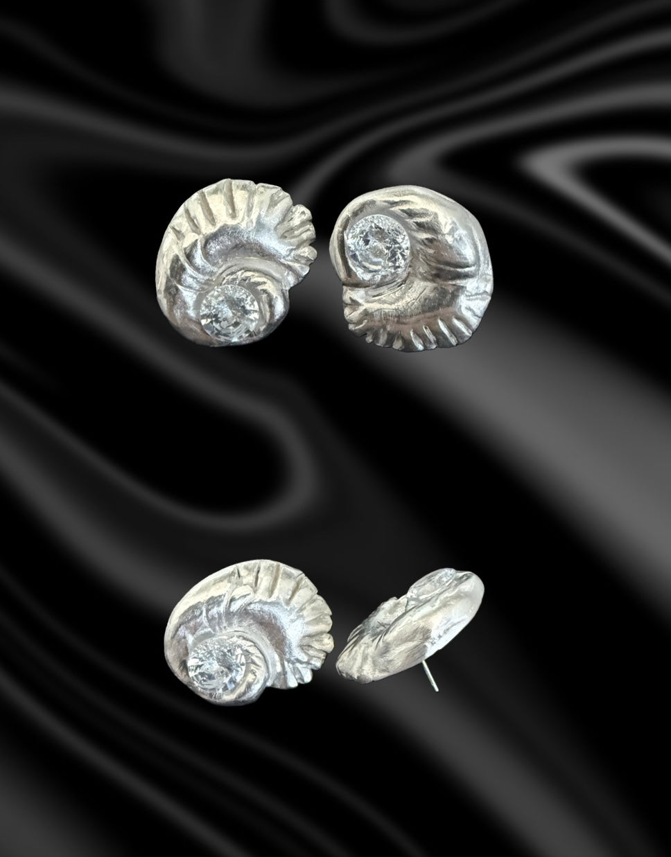 Embrace the beauty of the sea with these exquisite seashell stud earrings, meticulously handcrafted from precious Art Clay Silver—refined into .999 pure fine silver for a radiant, lasting finish. Each earring captures the graceful curves of a seashell, symbolizing peace, renewal, and a deep connection to nature.